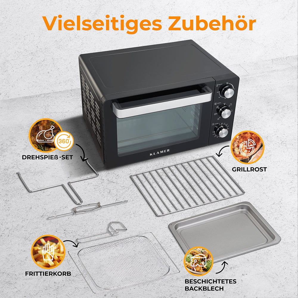 Mini-Backofen mit vielseitigem Zubehör wie Drehspieß-Set, Grillrost und Frittierkorb auf einem Tisch.